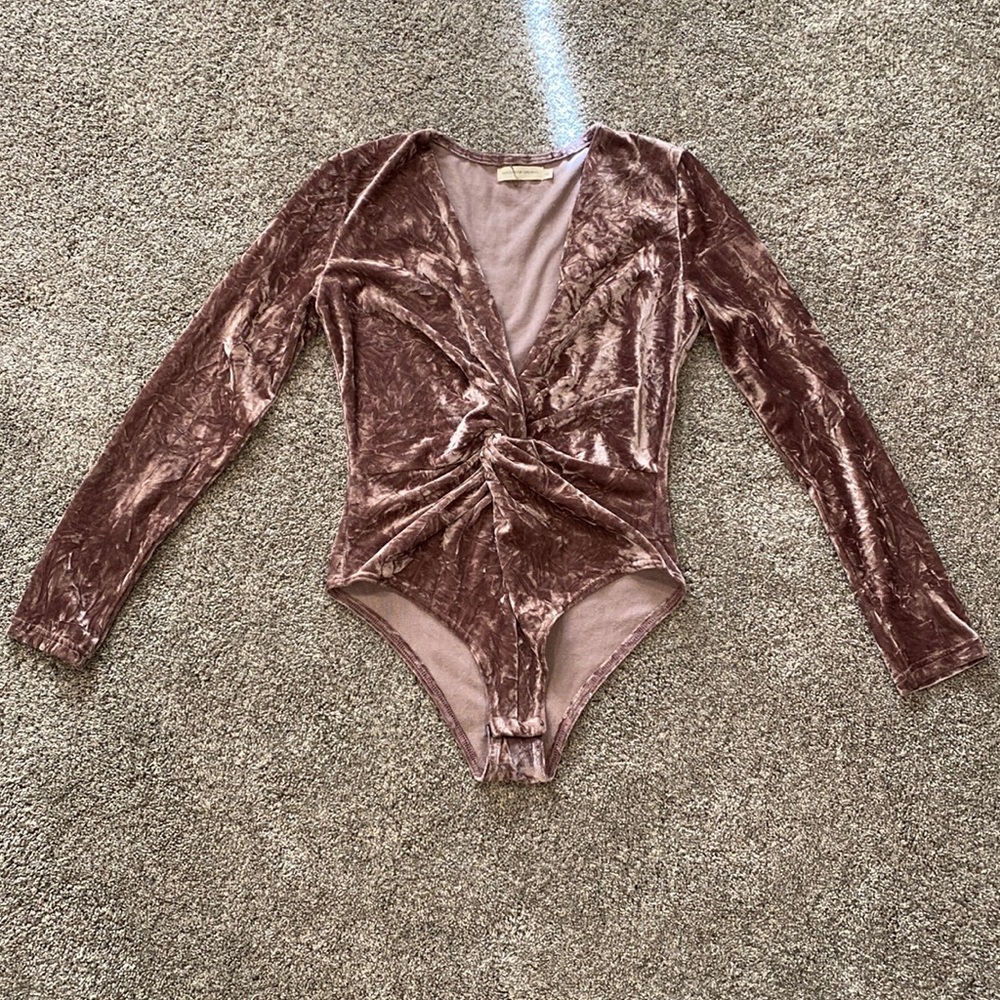 Mauve Velvet Long Sleeve Bodysuit with dramatic plunge and front twist detail